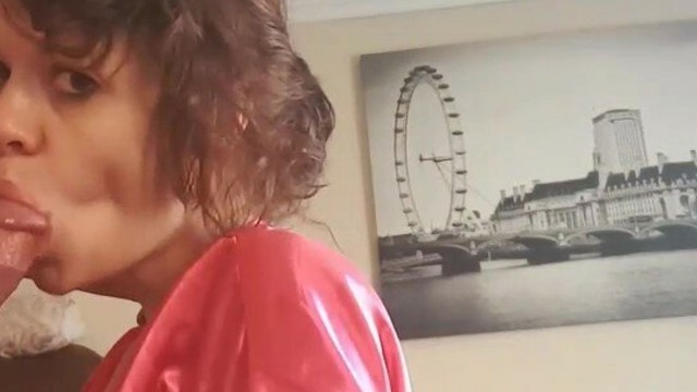 Girl in pink robe sucking cock and giving handjob till she cums